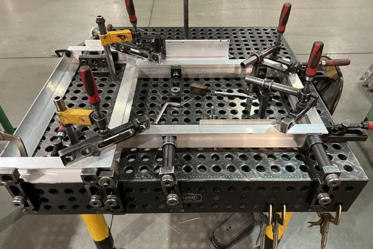aluminum weldment on welding table fixture large welding & metal fabrication services