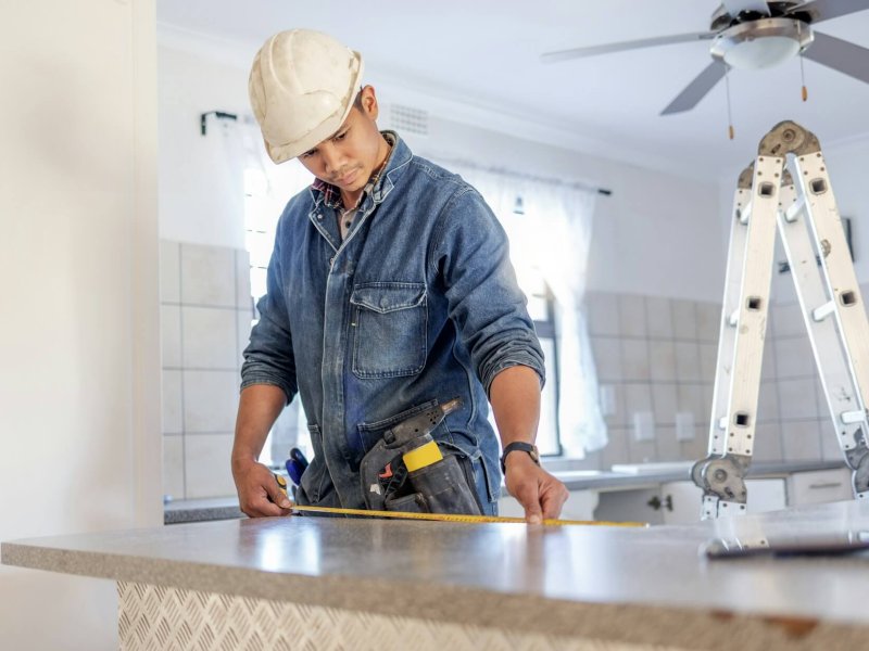 construction measurement and handyman doing home repair renovation and building a counter servic qlgt1a0e3yevugikjjp7qepfizw2l1hzii5jb9s29c.jpg