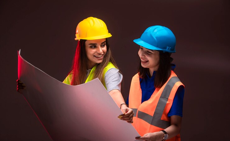 female construction engineers working together discussing project plan 114579 17748.jpg